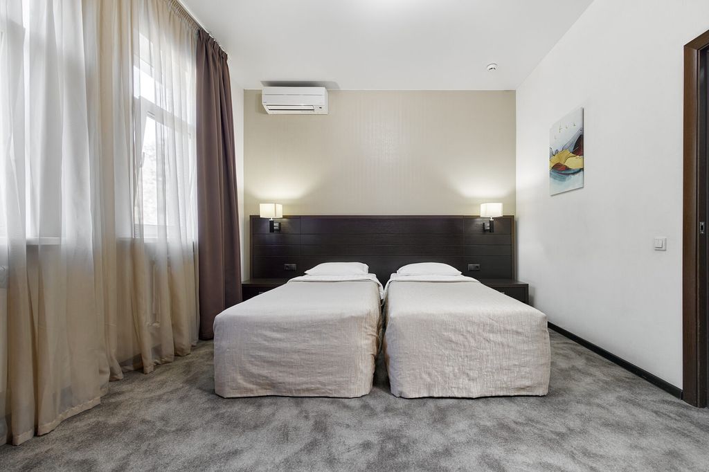 Двухместный номер с 2 отдельными кроватями стандарт плюс