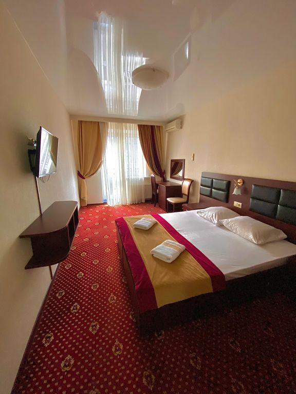 Двухместный номер с 2 отдельными кроватями люкс