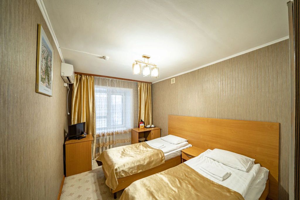 Двухместный номер с 2 отдельными кроватями эконом