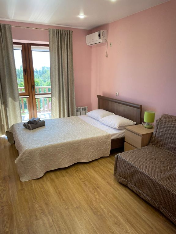 Четырёхместный номер стандарт с балконом