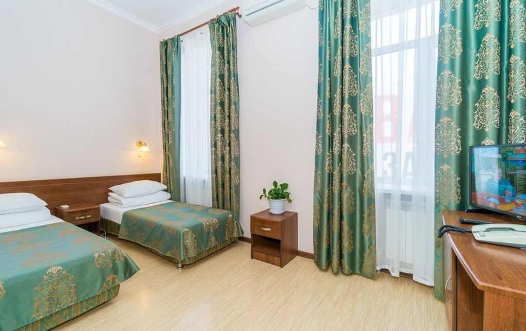 Двухместный номер с 2 отдельными кроватями стандарт