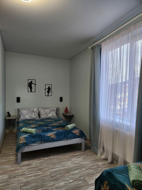 Трёхместный номер улучшенный с видом на горы