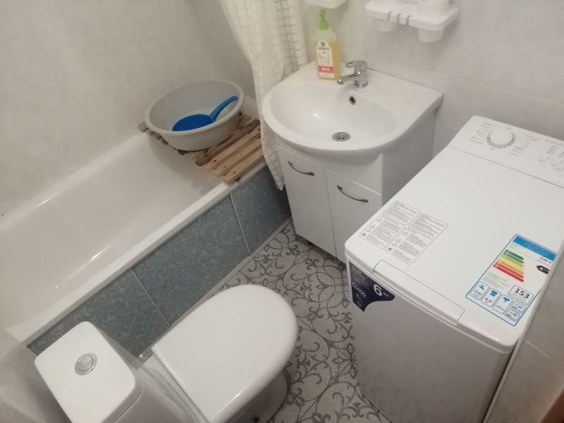 Стиральная машина с вертикальной загрузкой.