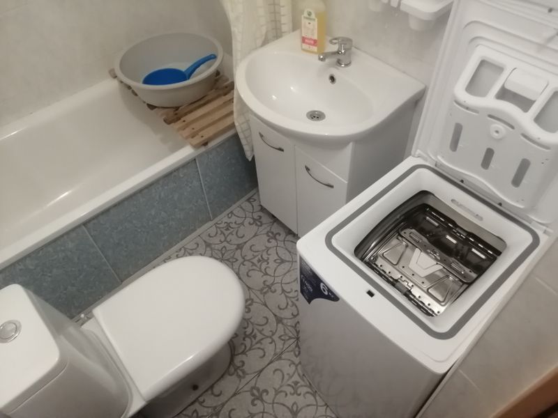 Стиральная машина с вертикальной загрузкой.