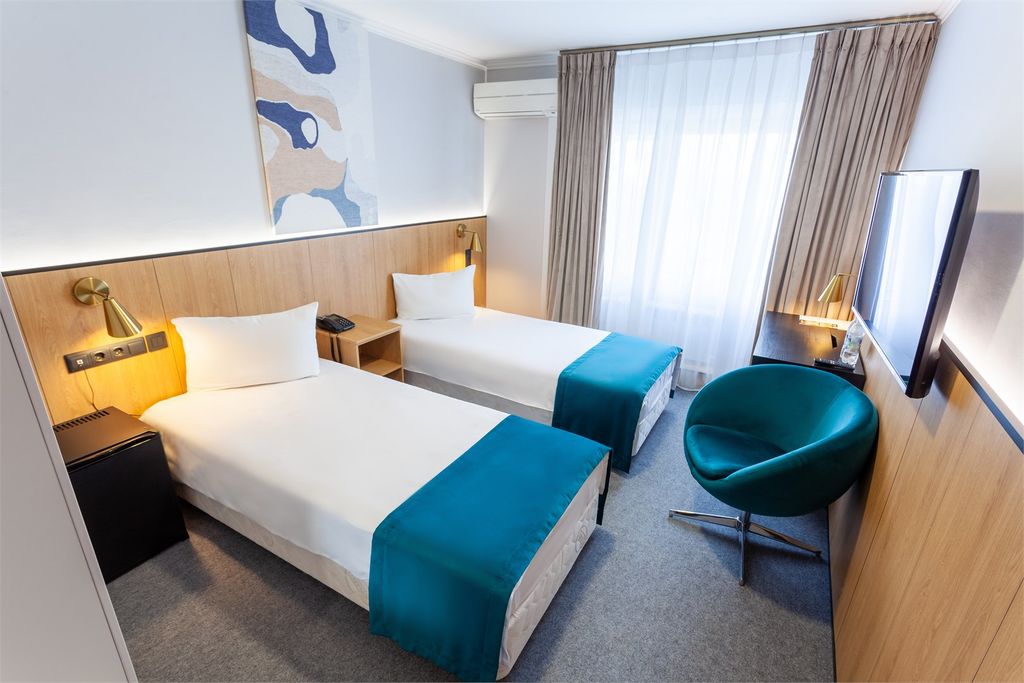 Двухместный номер с 2 отдельными кроватями улучшенный