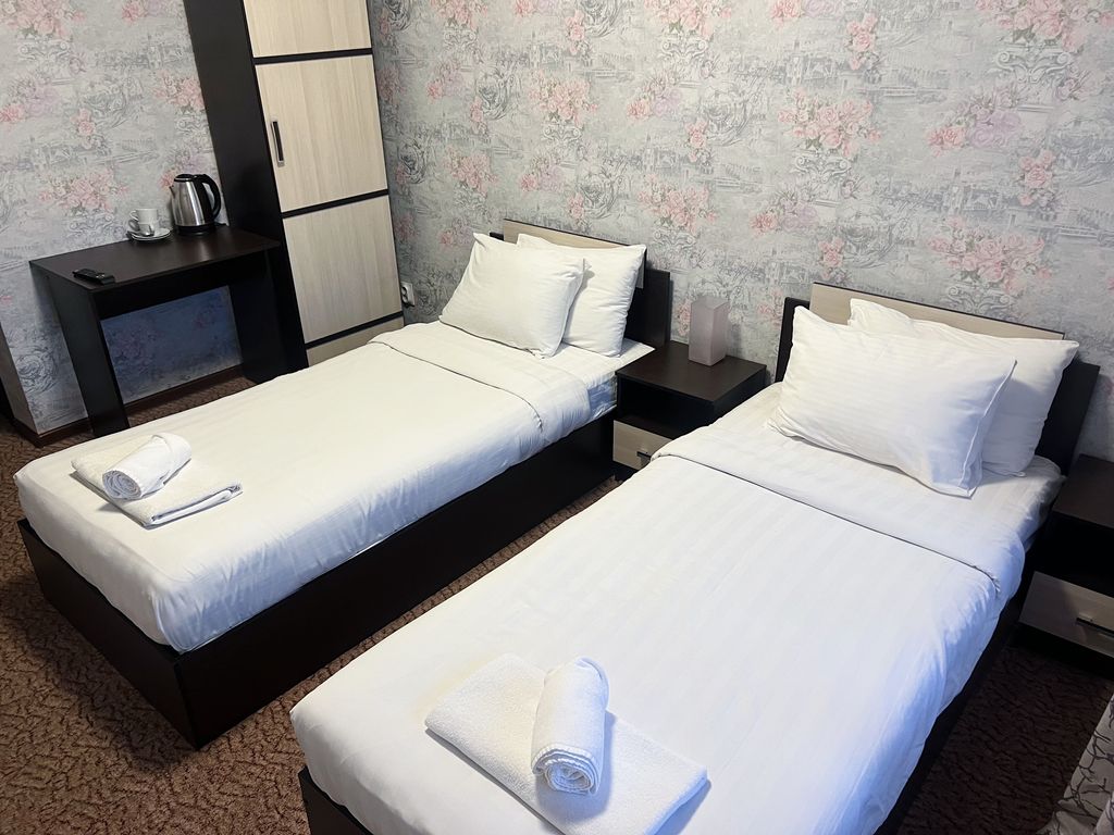 Двухместный номер с 2 отдельными кроватями улучшенный