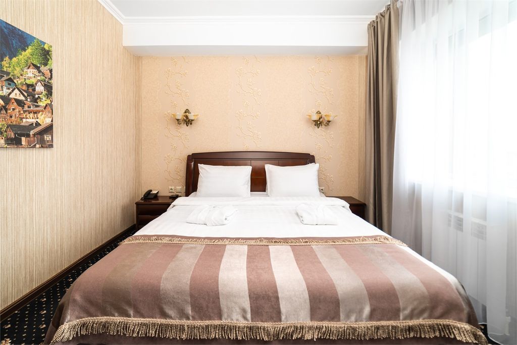 Двухместный номер с 1 кроватью Джуниор Сюит