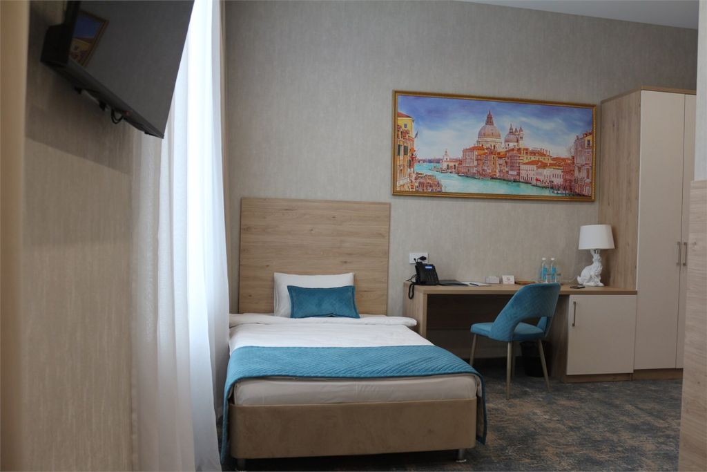 Двухместный номер с 2 отдельными кроватями Первая категория Стандарт подходит для гостей с ограниченными возможностями