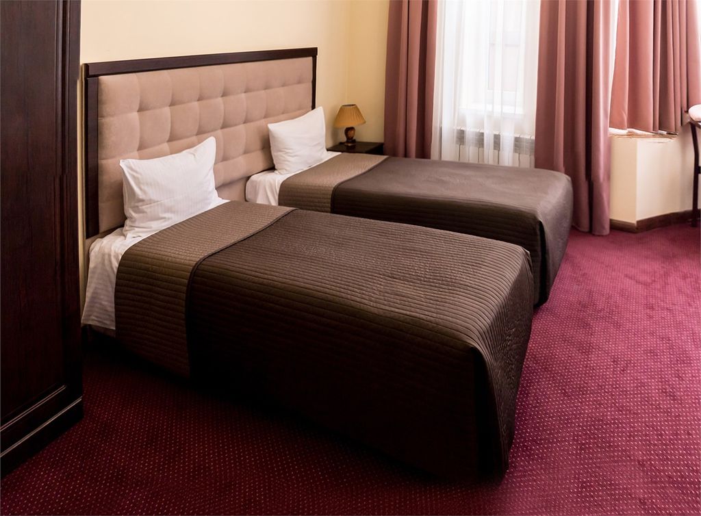 Двухместный номер с 2 отдельными кроватями улучшенный