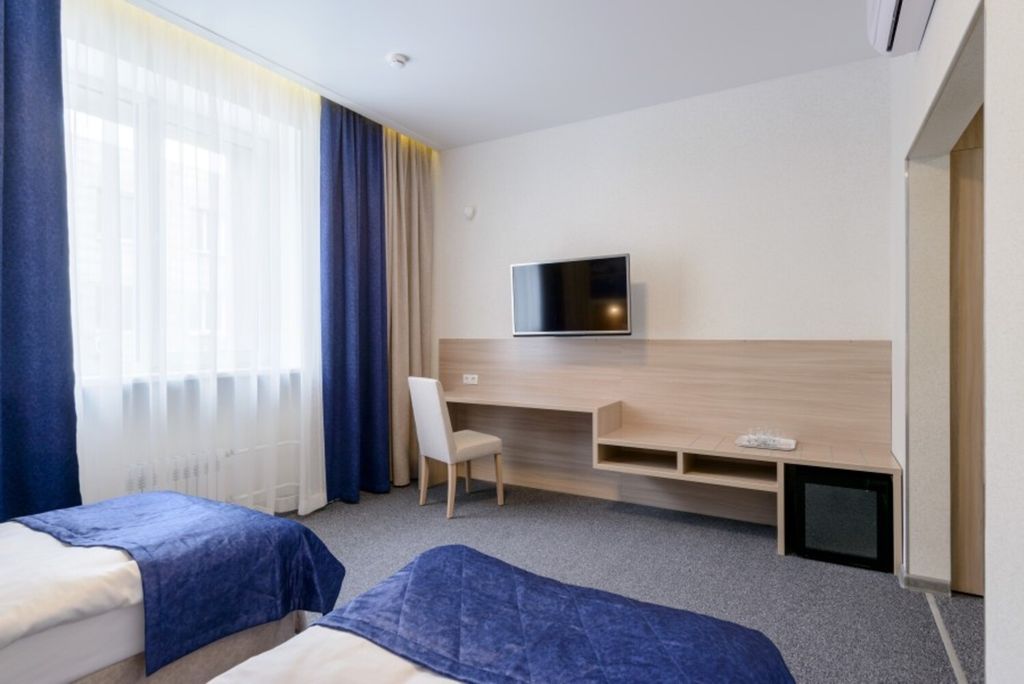 Двухместный номер с 2 отдельными кроватями бизнес