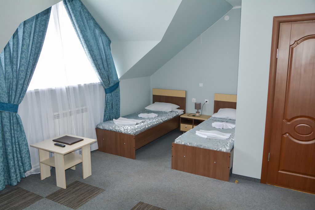 Двухместный номер с 2 отдельными кроватями стандарт