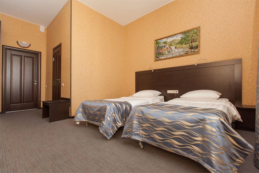 Двухместный номер с 2 отдельными кроватями или 2 раздельными улучшенный