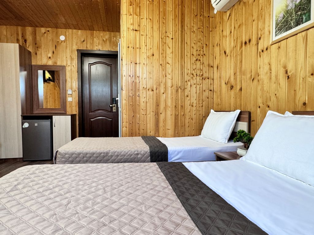 Двухместный номер с 2 отдельными кроватями мансардный номер улучшенный