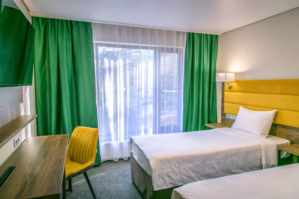 Двухместный номер с 2 отдельными кроватями стандарт