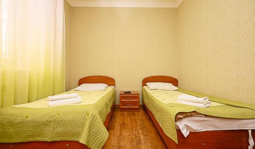 Двухместный номер с 2 отдельными кроватями в блоке