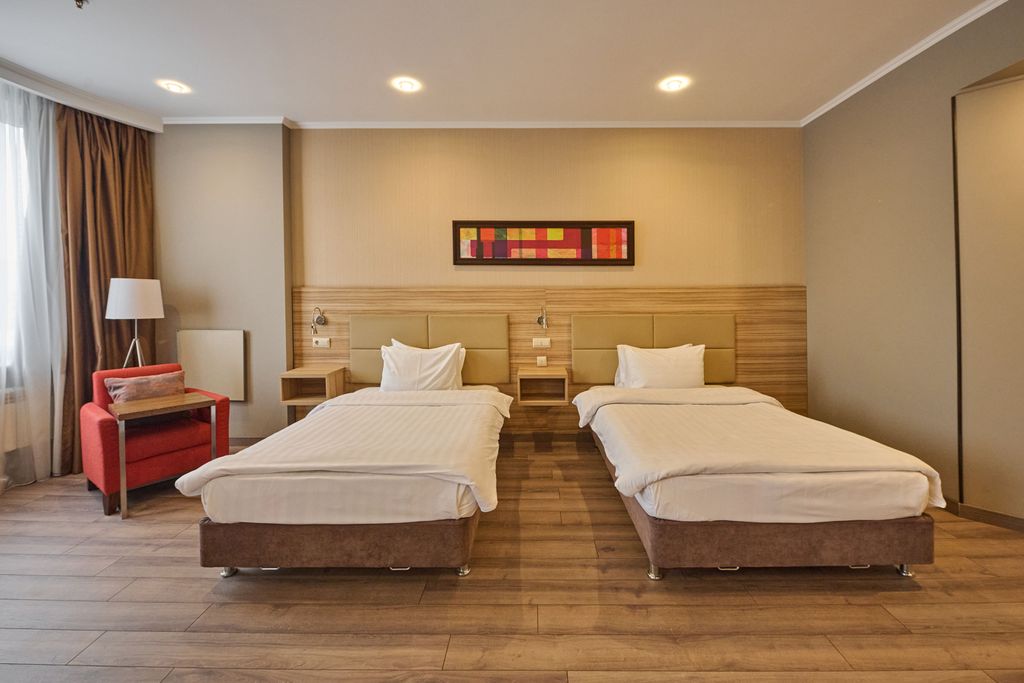 Двухместный номер с 2 отдельными кроватями делюкс