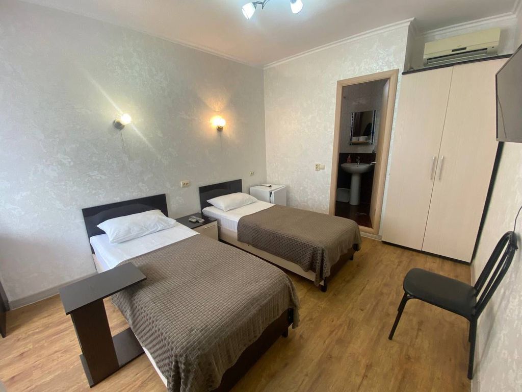 Двухместный номер с 2 отдельными кроватями стандарт