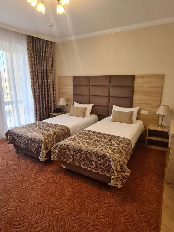 Двухместный номер с 2 отдельными кроватями стандарт