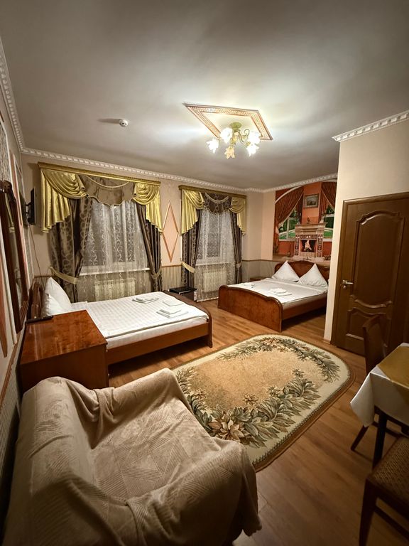 Семейный номер Семейный с 2 двухместными кроватями