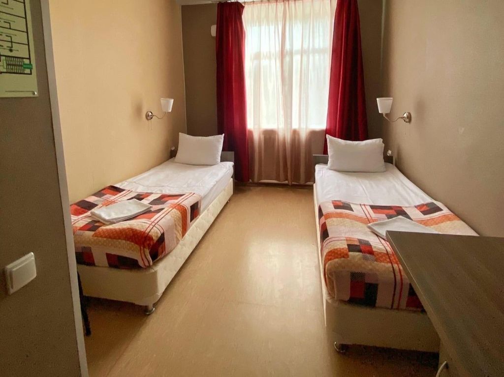 Двухместный номер с 2 отдельными кроватями Стандарт благоустроенный