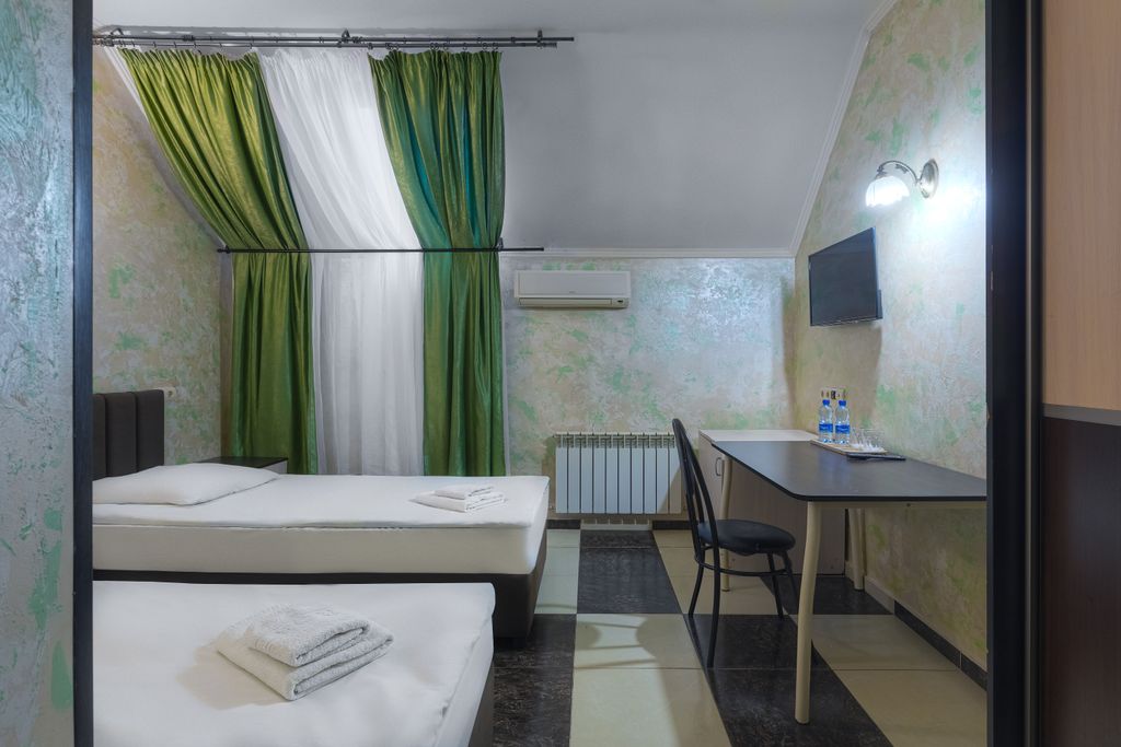 Двухместный номер с 2 отдельными кроватями стандарт