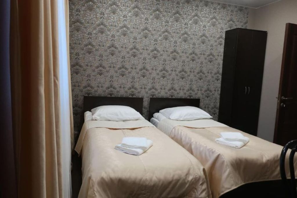 Двухместный номер с 2 отдельными кроватями и душем