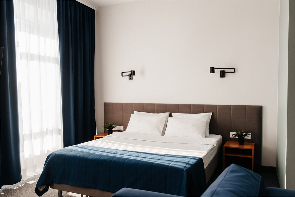 Двухместный номер с 1 кроватью улучшенный стандартный сюит