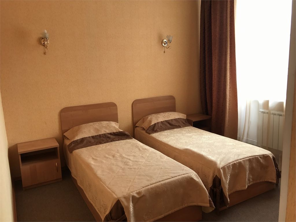 Двухместный номер с 2 отдельными кроватями стандарт 2-х комнатный