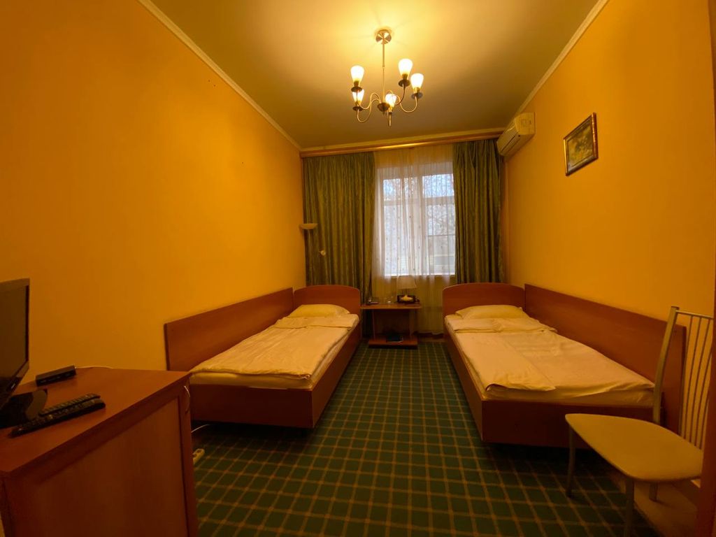 Двухместный номер с 2 отдельными кроватями стандарт