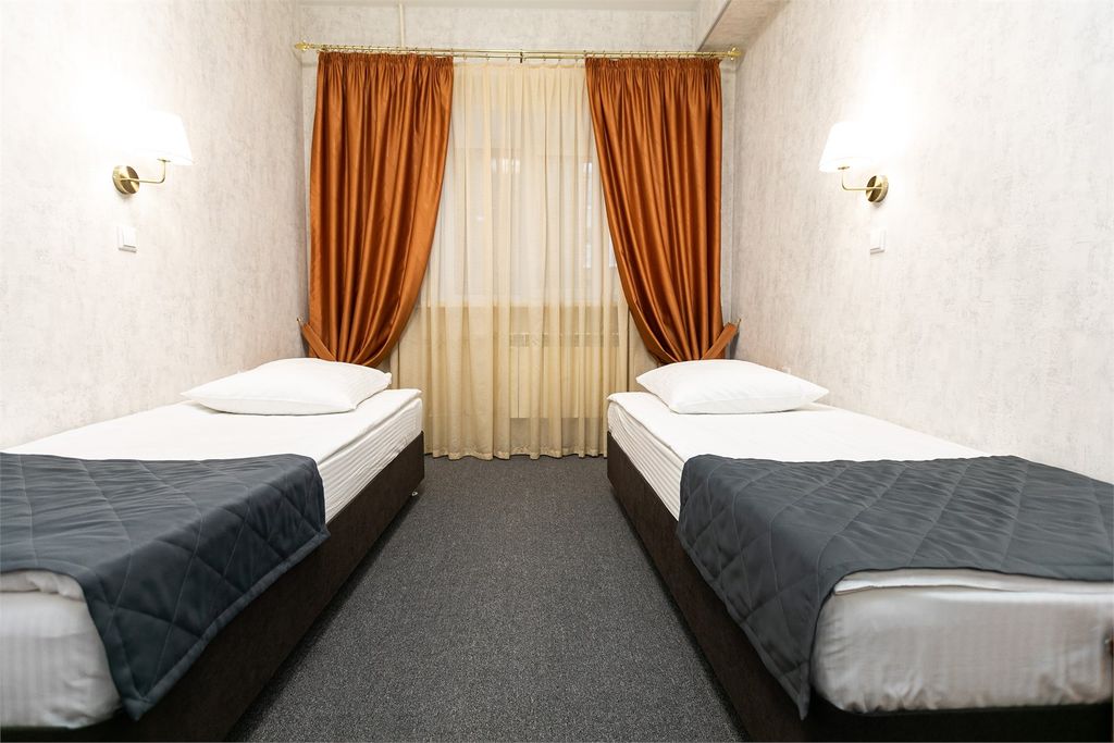 Двухместный номер с 2 отдельными кроватями стандарт