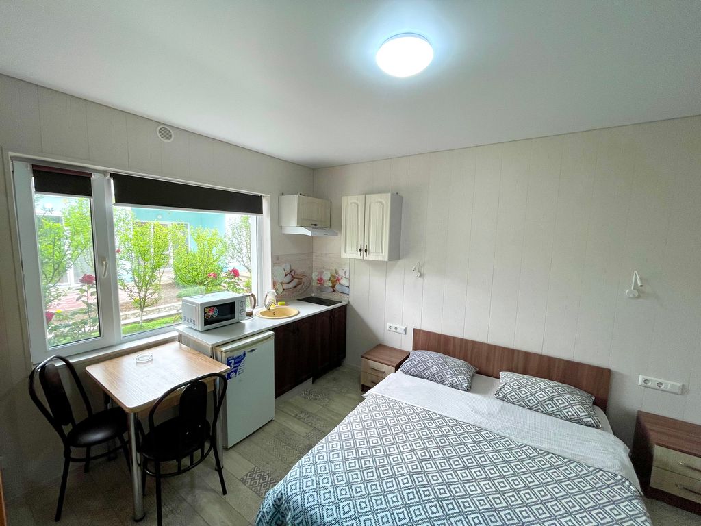 Четырёхместный номер Студия с видом на сад первая линия