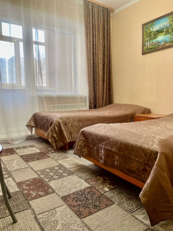 Двухместный номер с 2 отдельными кроватями улучшенный