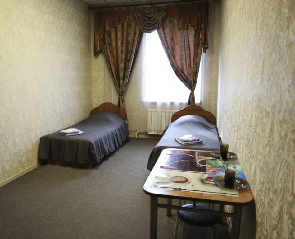 Двухместный номер с 2 отдельными кроватями эконом