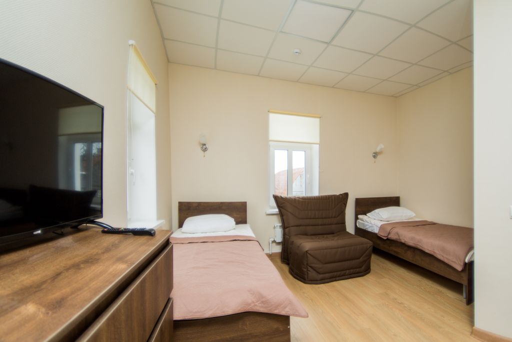 Двухместный номер с 2 отдельными кроватями с диваном и кондиционером