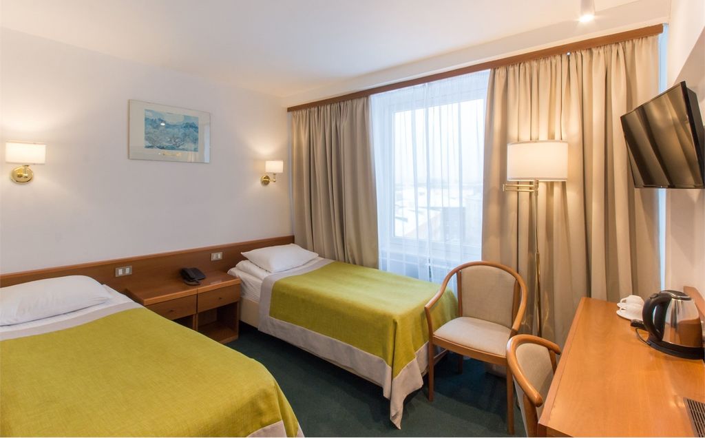 Двухместный номер с 2 отдельными кроватями бизнес