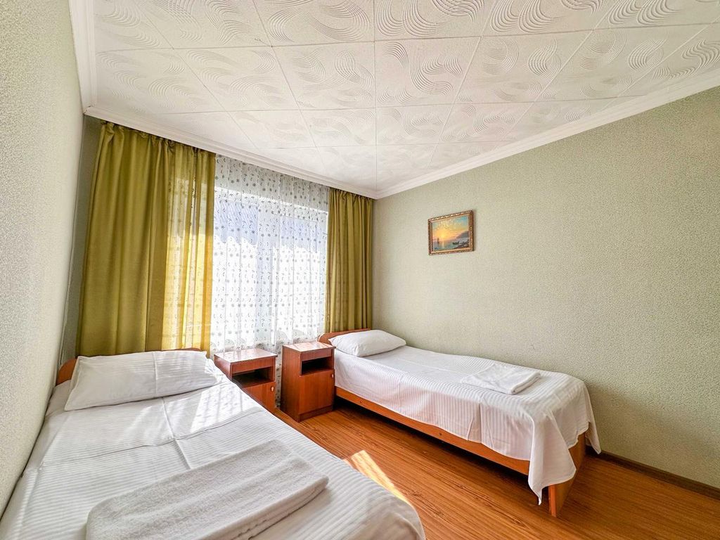 Двухместный номер с 2 отдельными кроватями эконом
