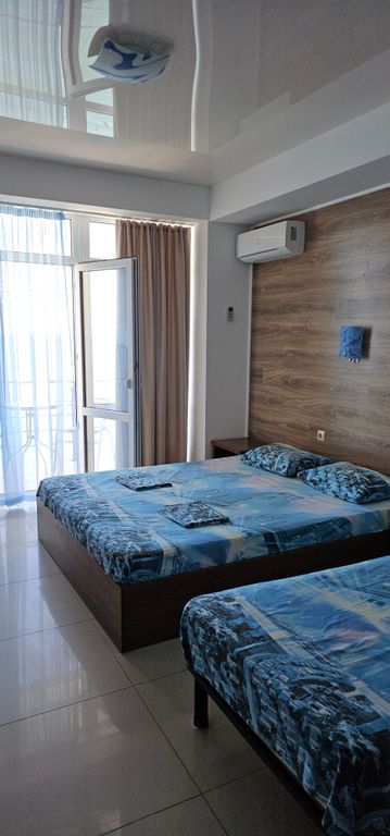 Трёхместный номер стандарт с видом на море