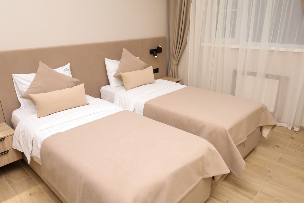 Двухместный номер с 2 отдельными кроватями стандарт