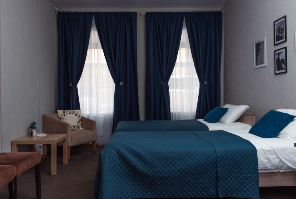 Двухместный номер с 2 отдельными кроватями с общей ванной комнатой