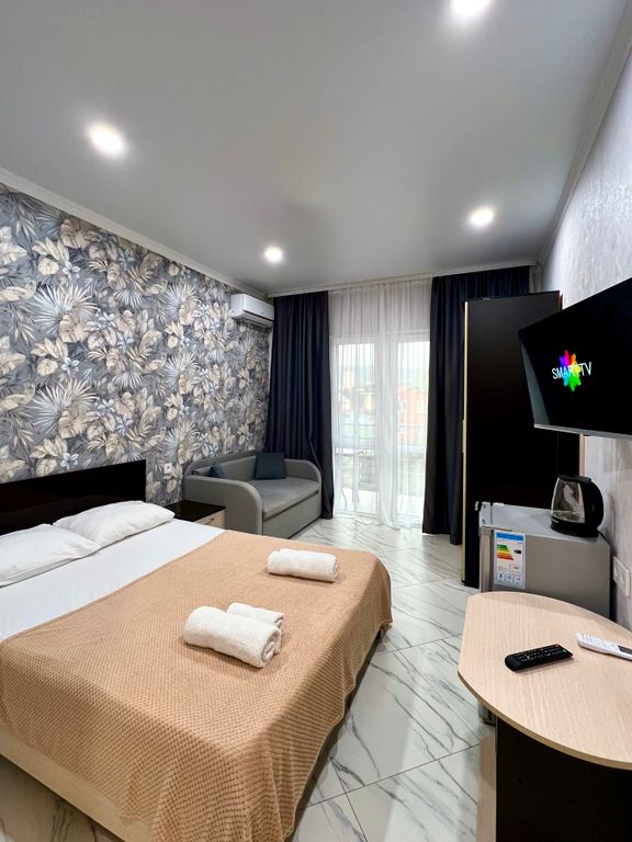 Четырёхместный номер улучшенный с видом на горы