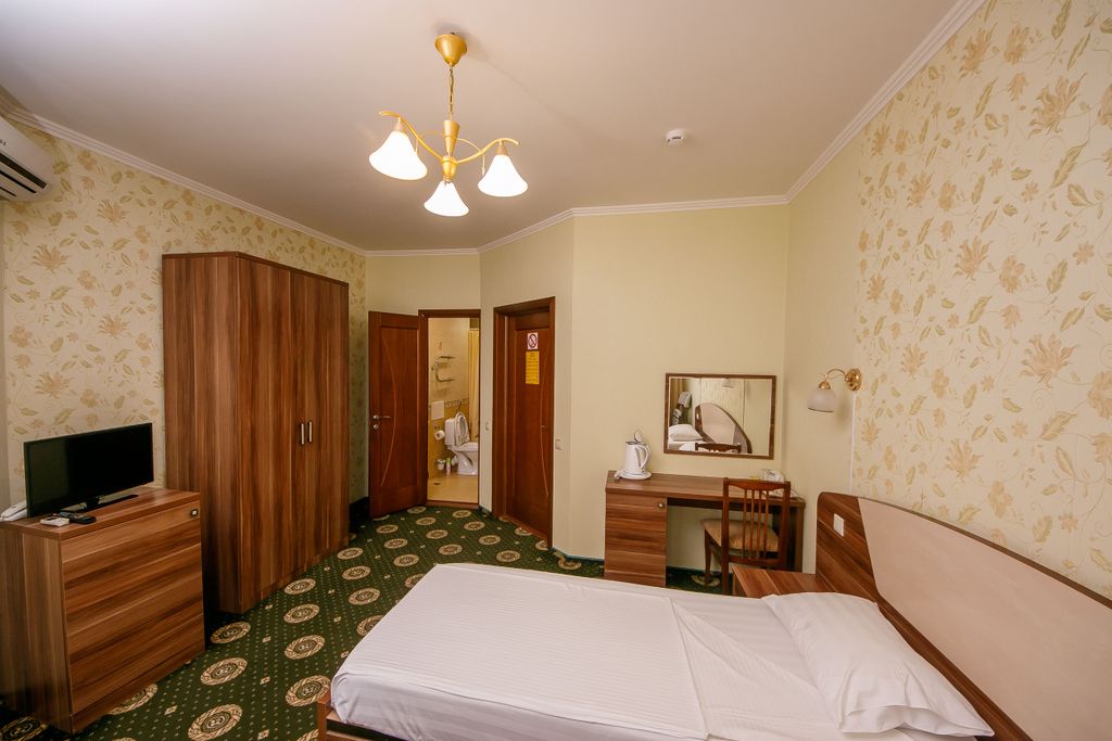 Двухместный номер с 1 кроватью или с двумя раздельными стандарт