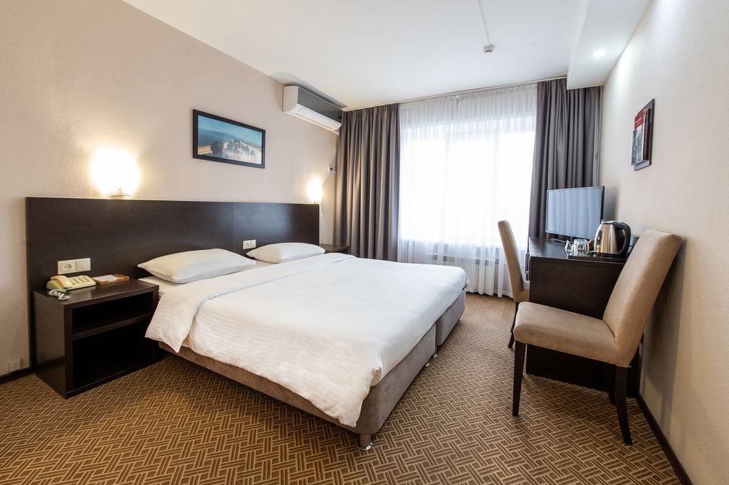 Двухместный номер с 2 отдельными кроватями стандарт