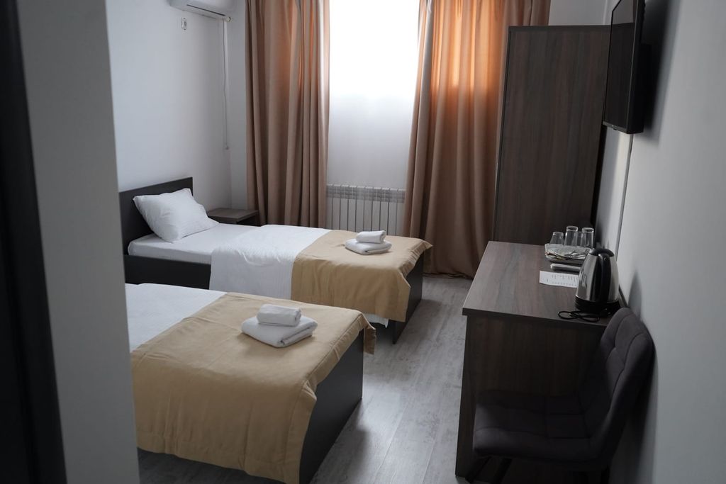 Двухместный номер с 2 отдельными кроватями стандарт