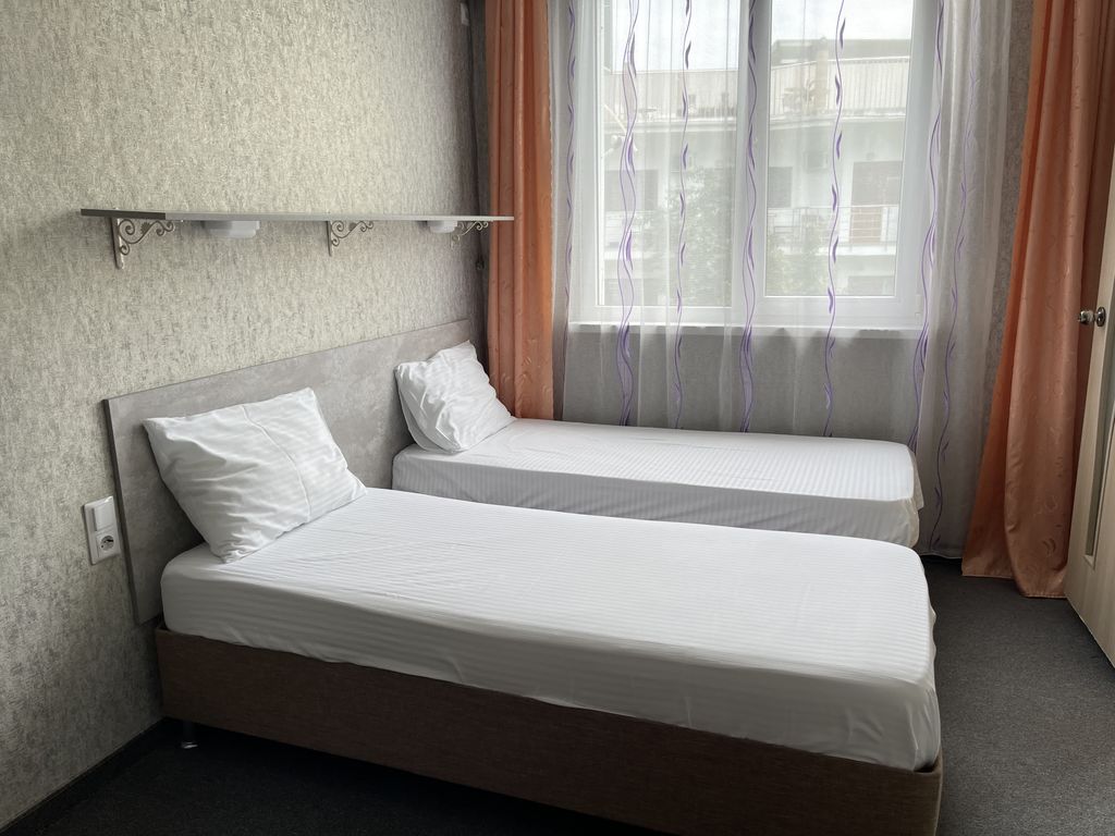 Двухместный номер с 2 отдельными кроватями стандарт