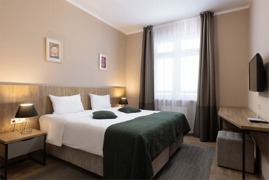 Семейный номер 2-комнатный с балконом и видом на горы