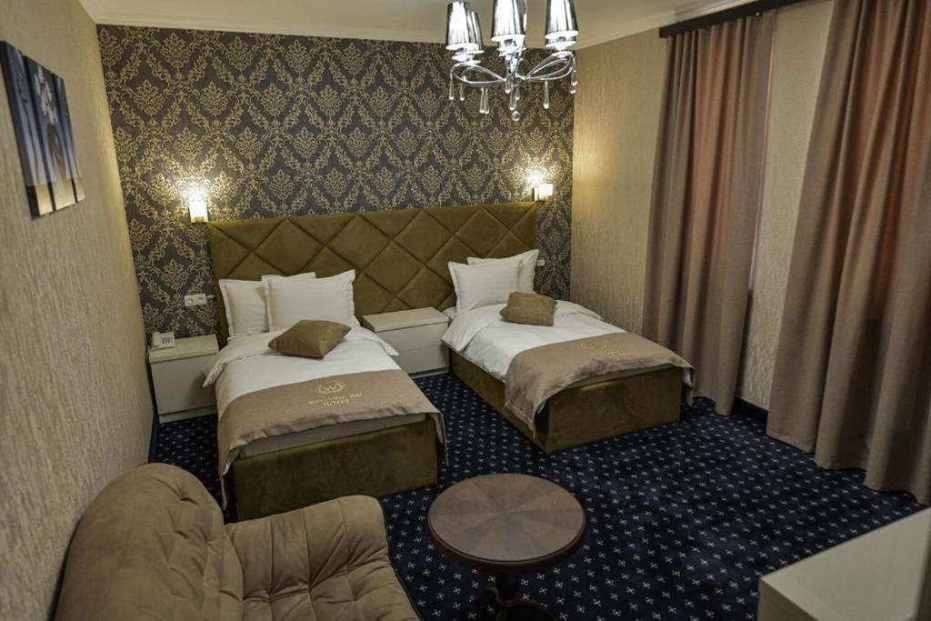 Двухместный номер с 2 отдельными кроватями стандарт