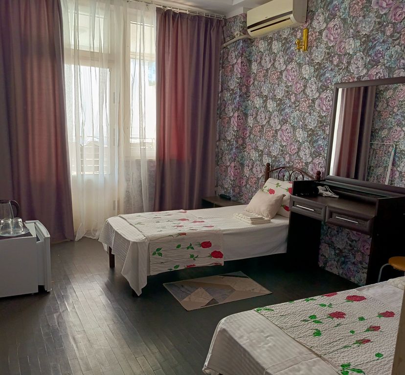 Двухместный номер с 2 отдельными кроватями улучшенный