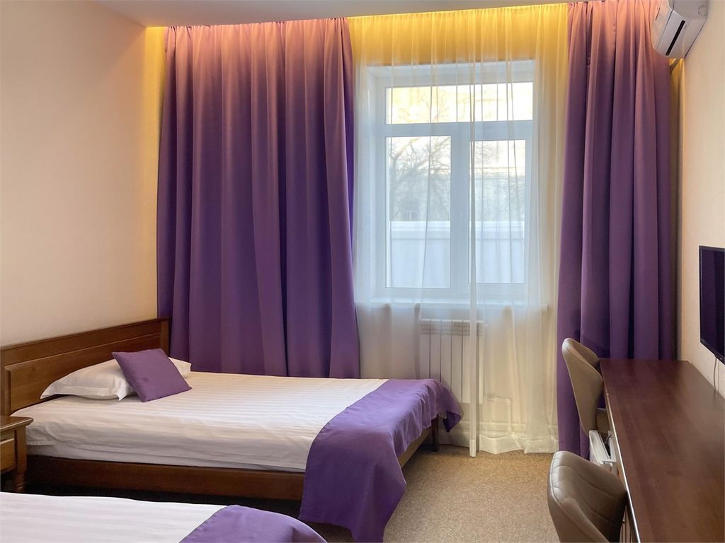 Двухместный номер с 2 отдельными кроватями улучшенный