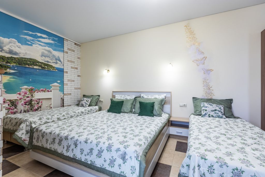 Четырёхместный номер делюкс с видом на море