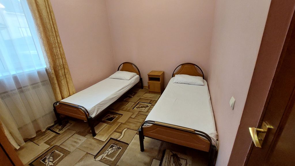 Двухместный номер с 2 отдельными кроватями стандарт